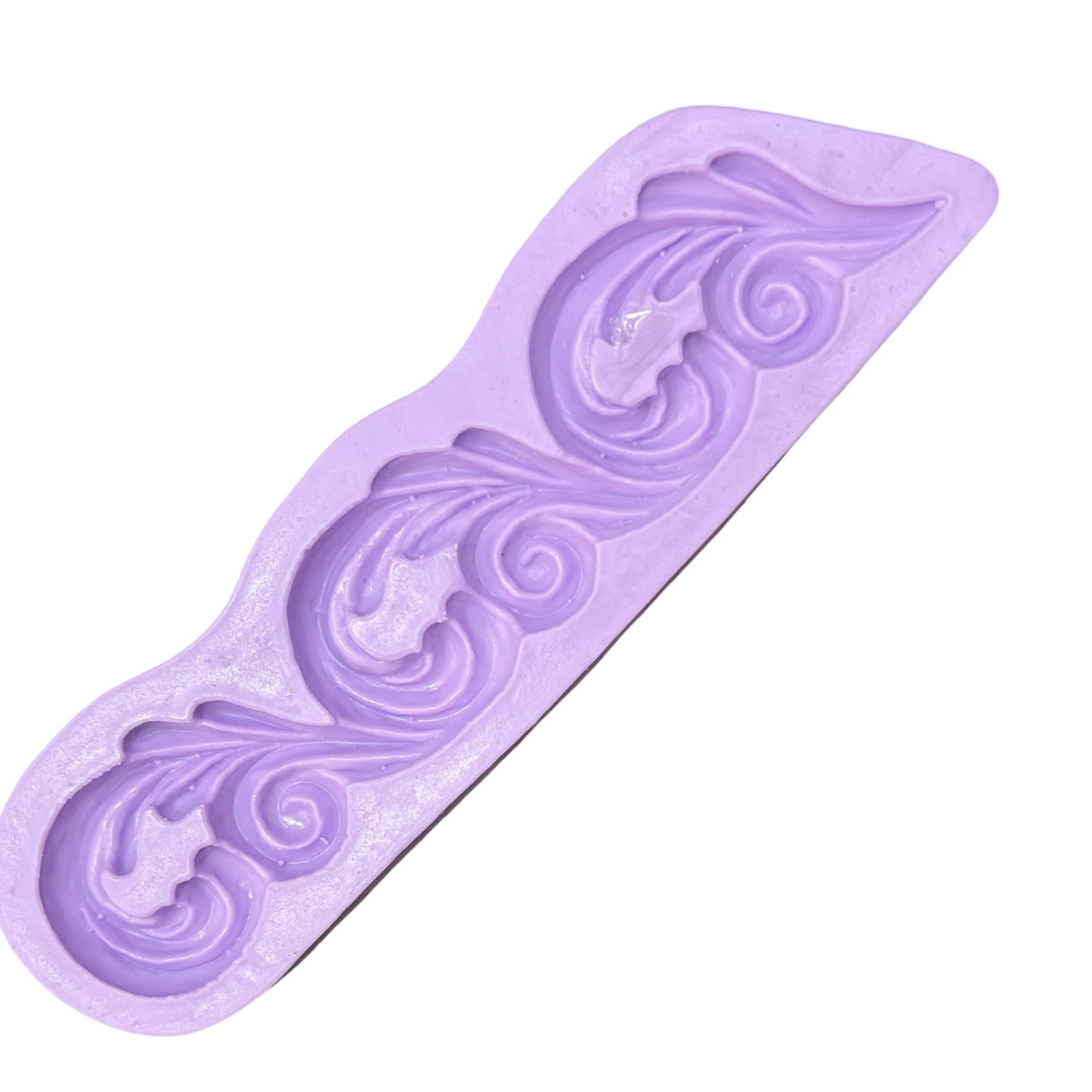 Molde de Silicone com formas de barrado em ondas.